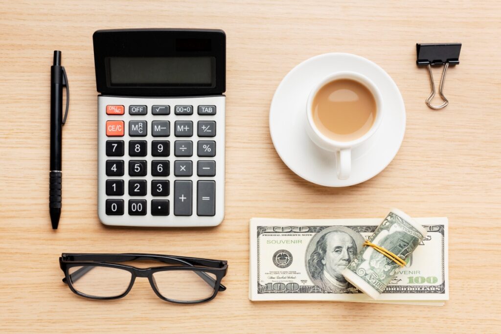 flat-lay-desk-arrangement-with-cash