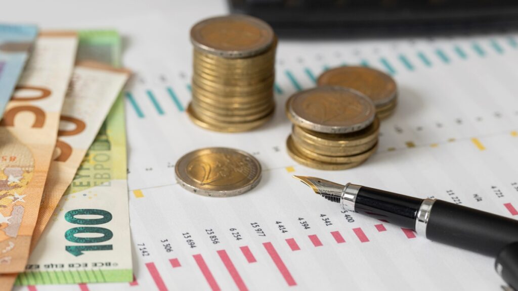 high-angle-coins-banknotes-arrangement